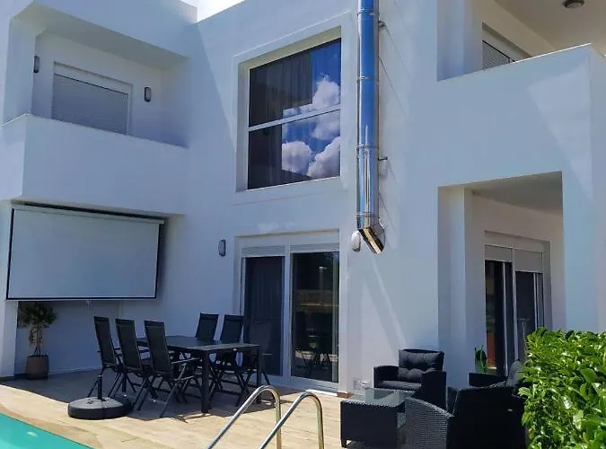 Rosemary Rhodes * Malona Village