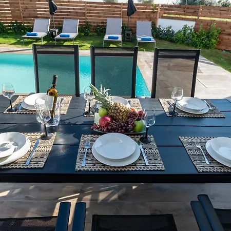 Rosemary Rhodes * Malona Village