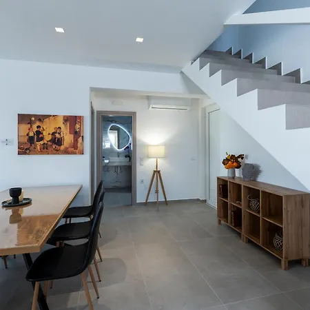 Rosemary Rhodes * Malona Village