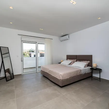 Rosemary Rhodes * Malona Village