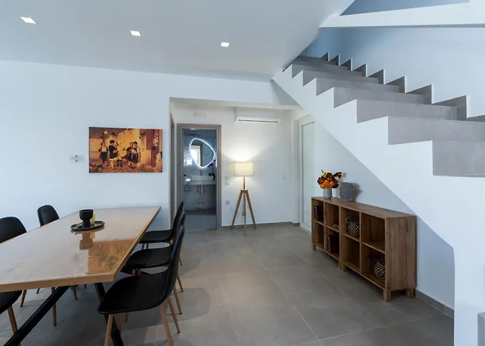 Rosemary Rhodes * Malona Village