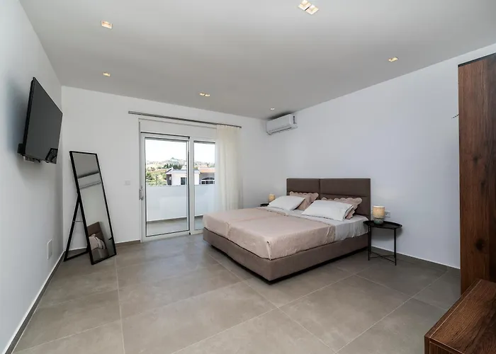 Rosemary Rhodes * Malona Village