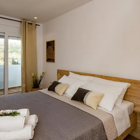 Rosemary Rhodes * Malona Village