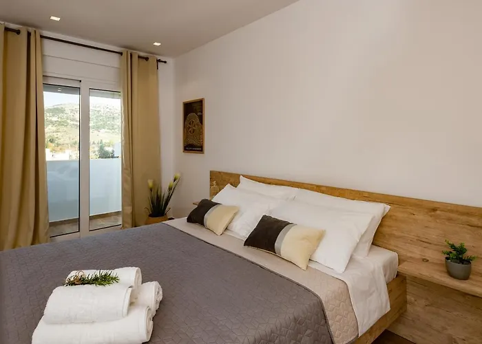 Rosemary Rhodes * Malona Village