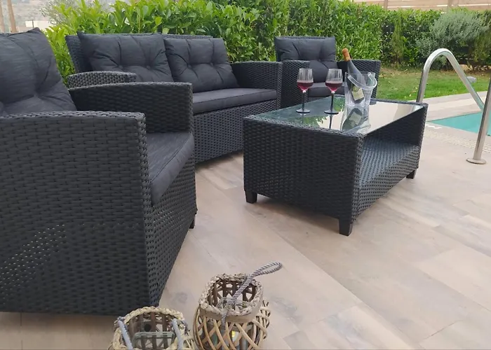 Rosemary Rhodes * Malona Village